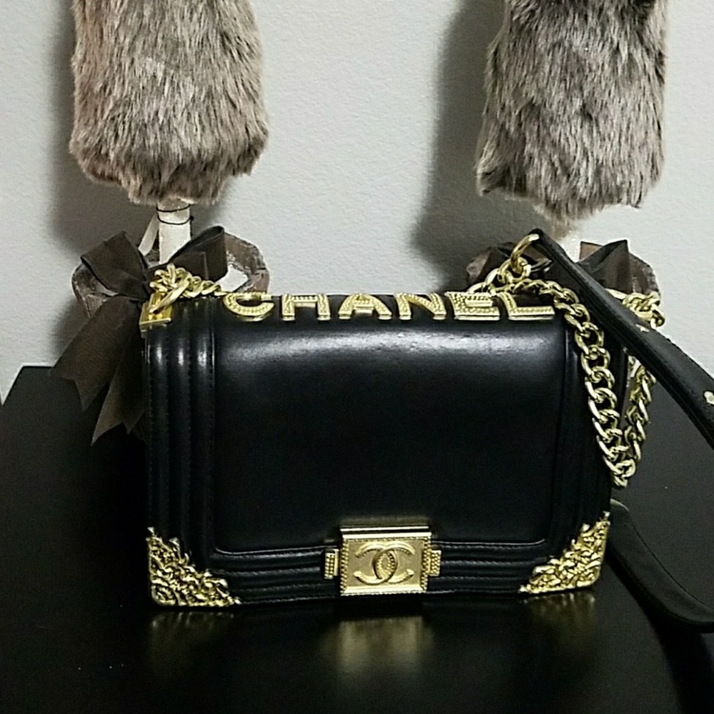 Le Boy Chanel like black and gold purse